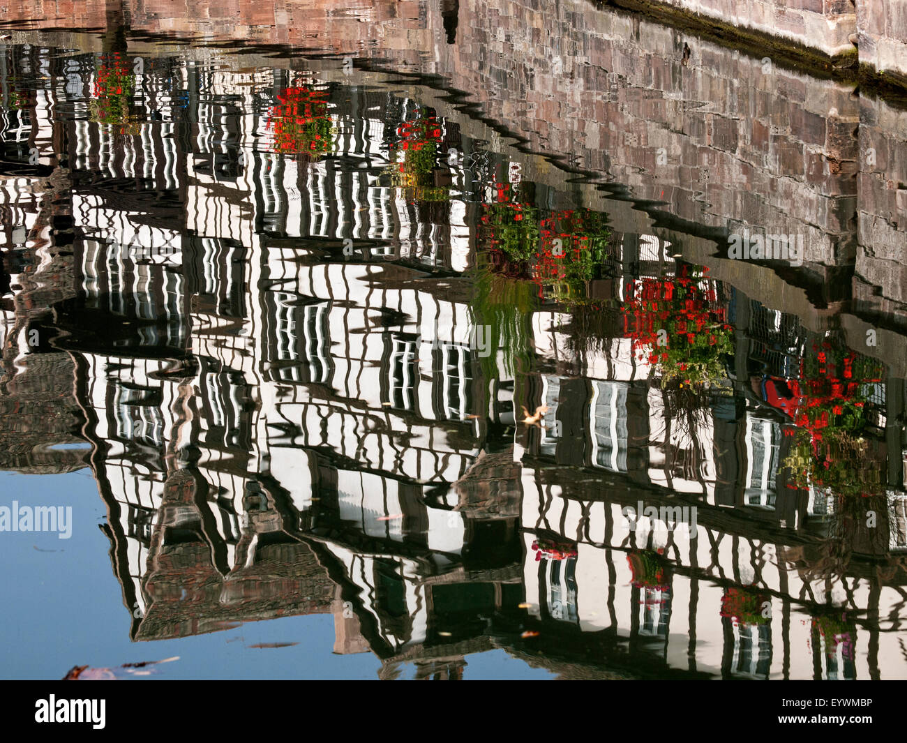 Strasbourg, capitol of Alsace region , reflections on the water of the Ill river Stock Photo