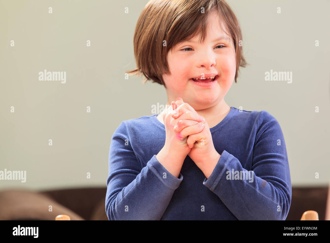 Little girl with Down Syndrome smiling Stock Photo Alamy
