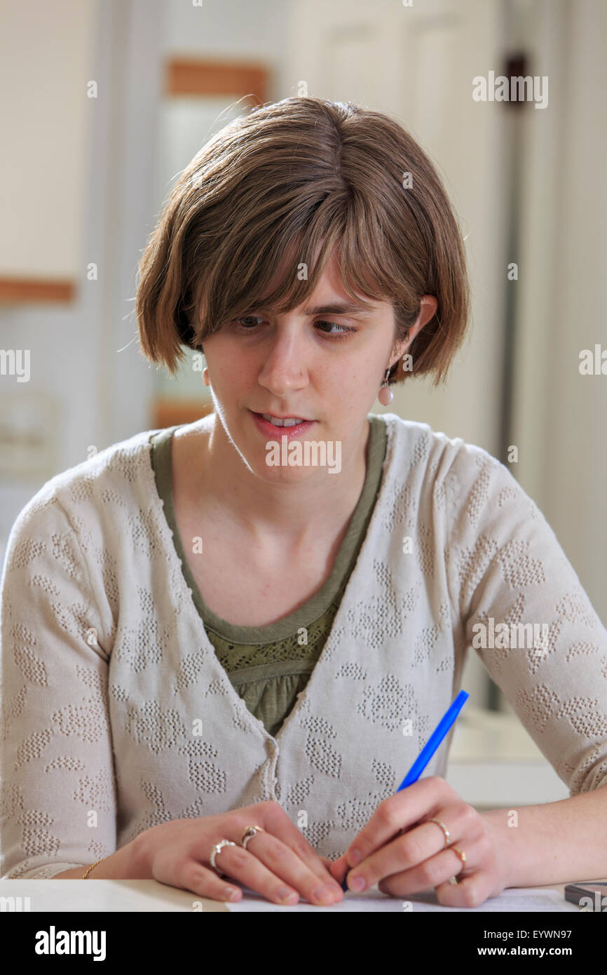 Blind woman signing documents with a pen Stock Photo Alamy