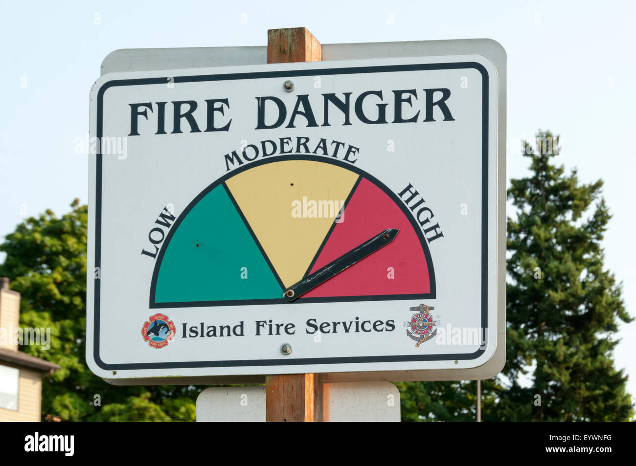A sign in Friday Harbor on San Juan Island warns of a high risk of fire due to hot summer weather. Stock Photo