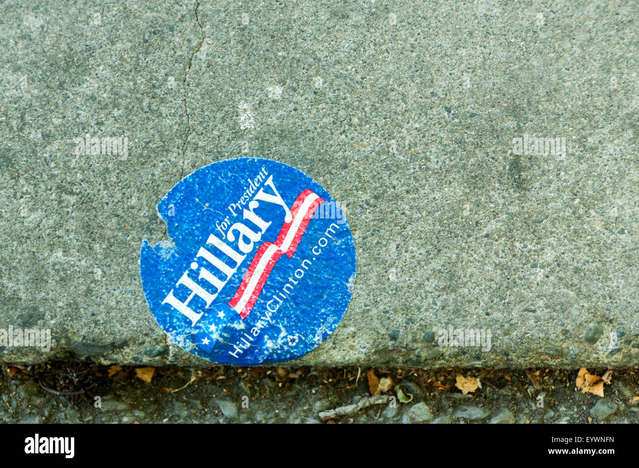 An abandoned Hillary Clinton campaign sticker reading Hillary for President. Stock Photo