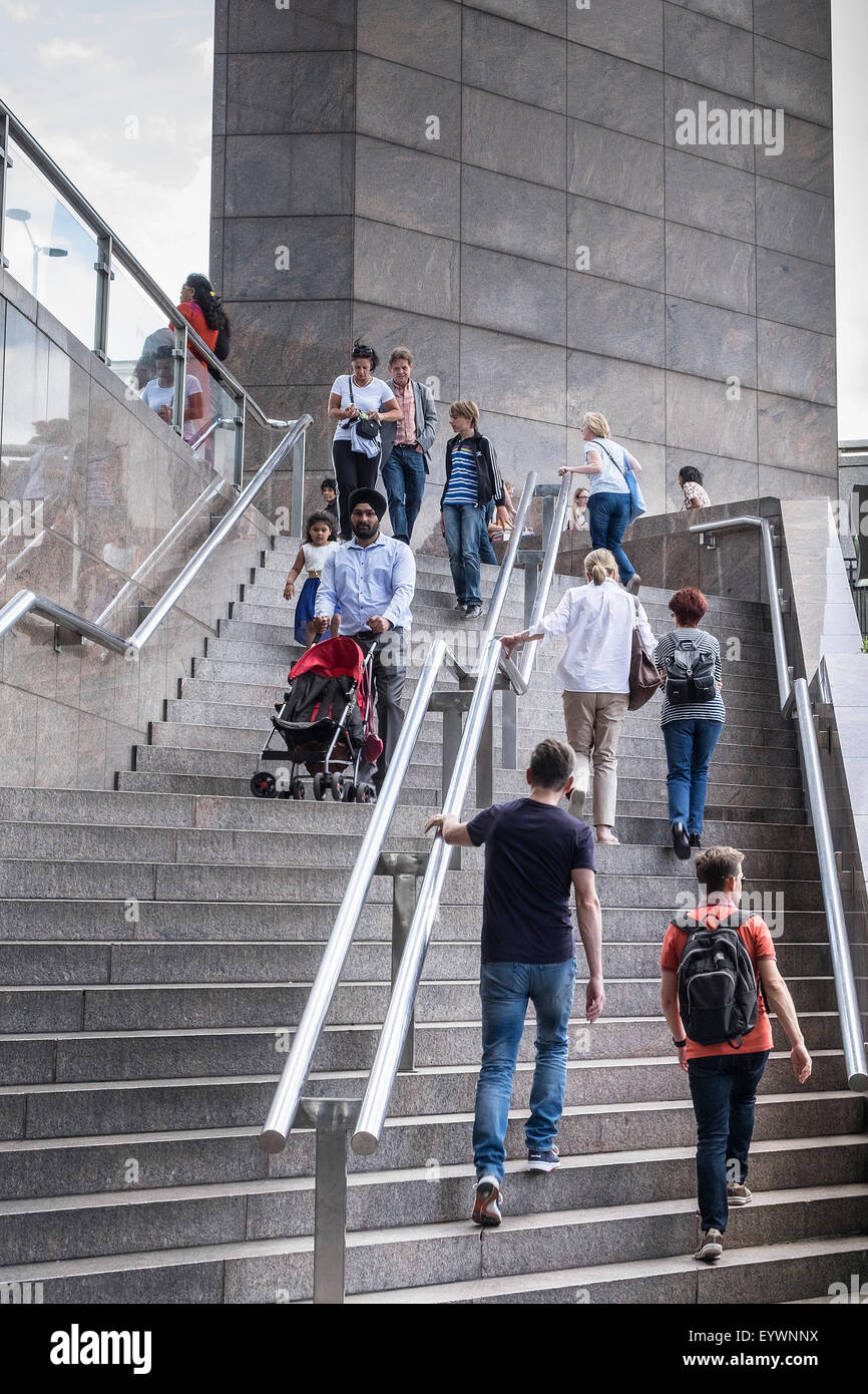 People walking up and down steps on the South Bank in London. Stock Photo