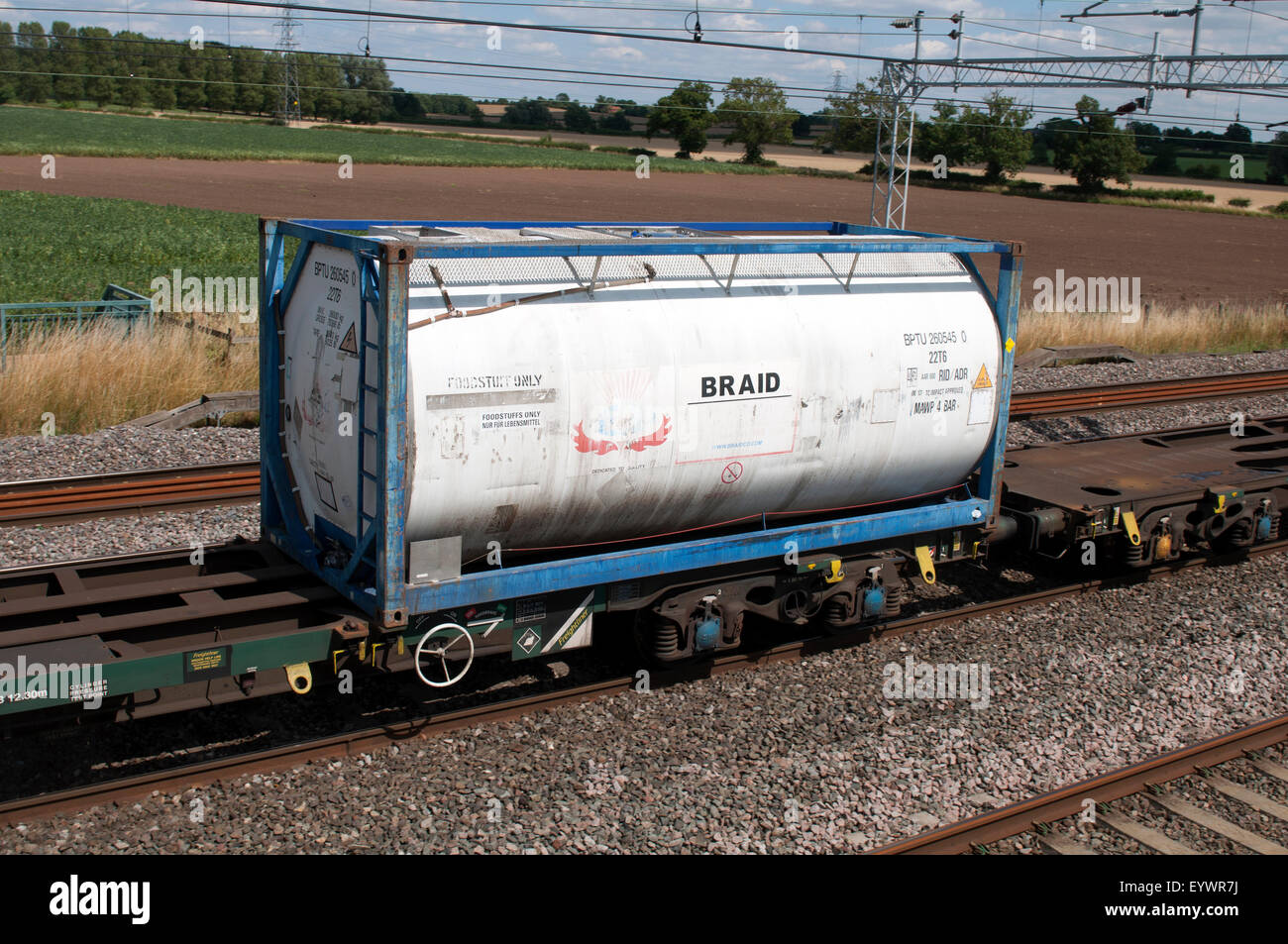 Braid foodstuff railway tank on the West Coast Main Line, Easenhall, Warwickshire, UK Stock Photo
