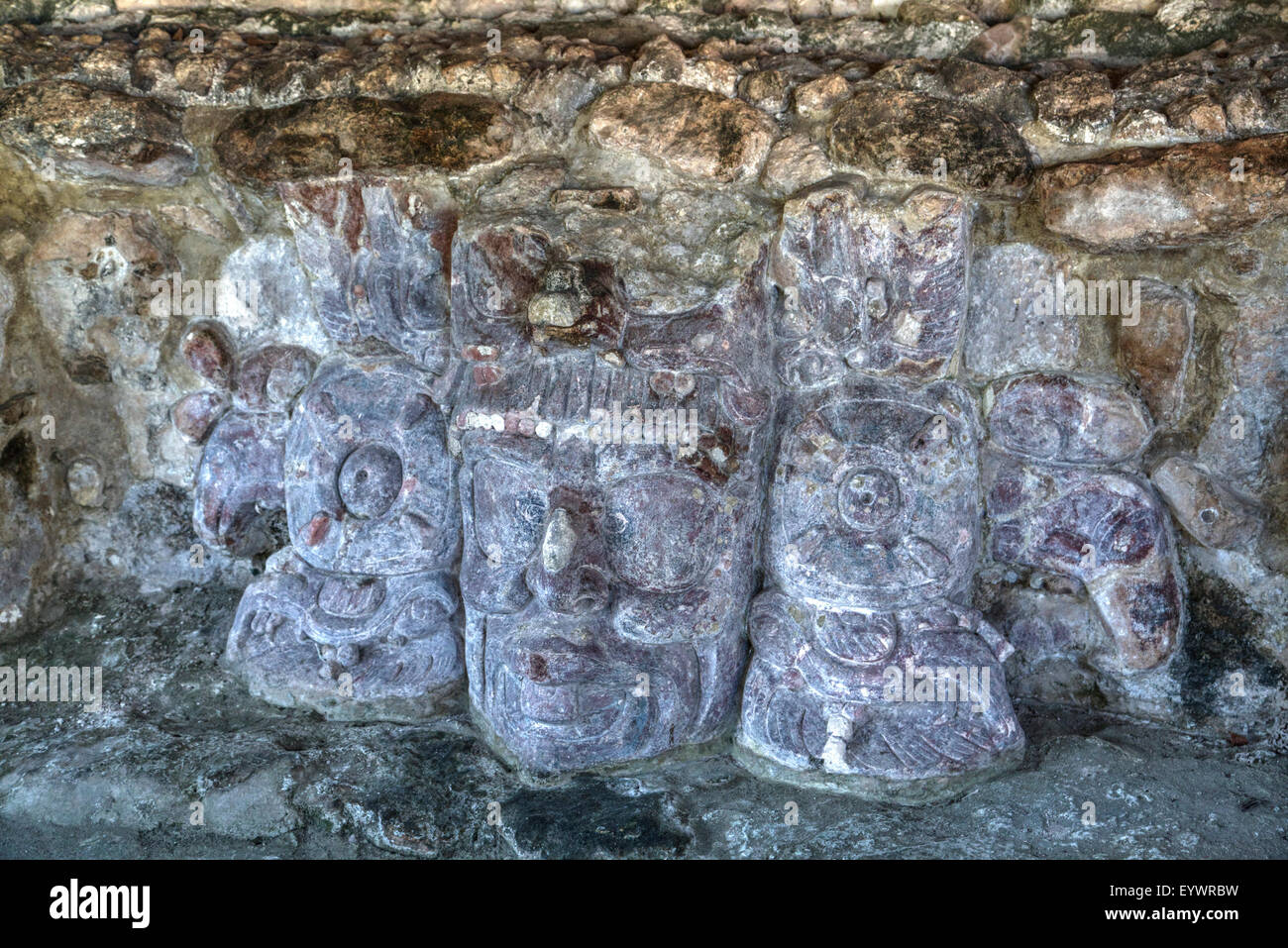 Carved stone masks, Temple of Masks, Edzna, Mayan archaeological site, Campeche, Mexico, North America Stock Photo