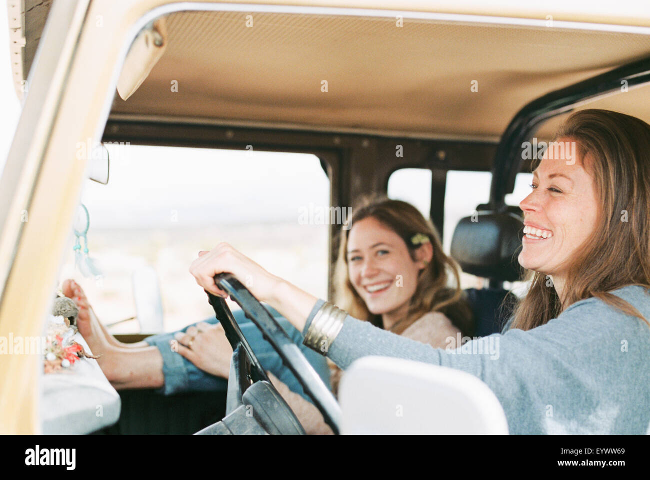 Two women on an outing in the desert, in a 4x4. Stock Photo