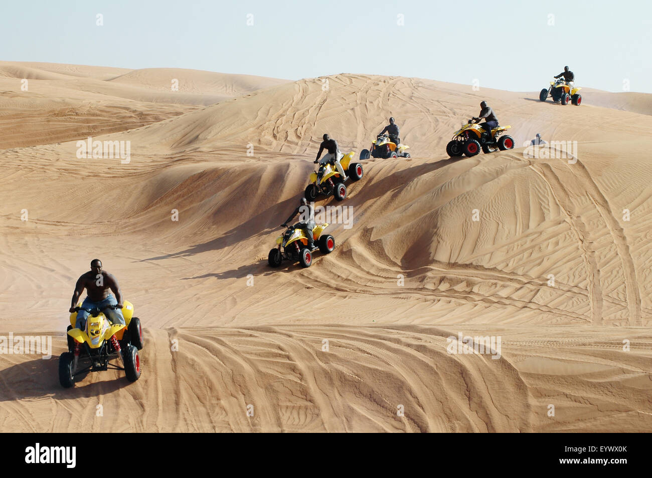 Bike Chasing In a Desert Stock Photo - Alamy