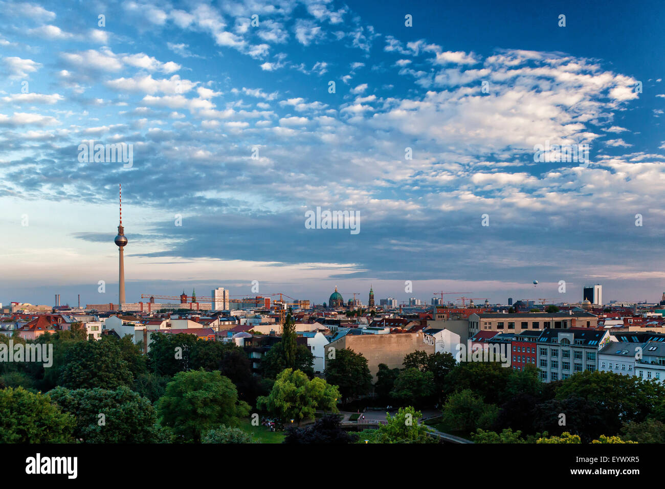 Berlin sunset view from apartment building rooftop. Dramatic evening landscape view of German capital city Stock Photo