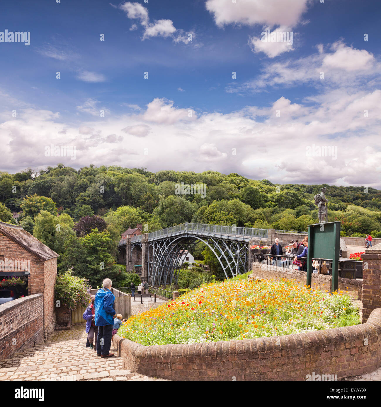 Tourists looking at Abraham Darby's Iron Bridge at Ironbridge, Shropshire, England Stock Photo