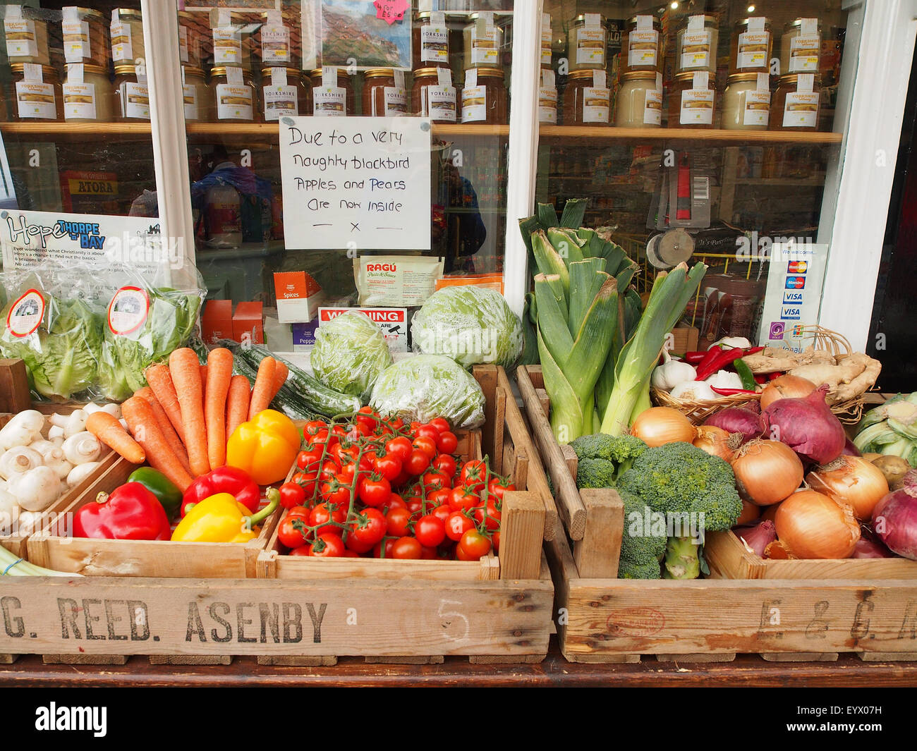 Goods on display in a traditional grocers shop window at Robin Hoods ...