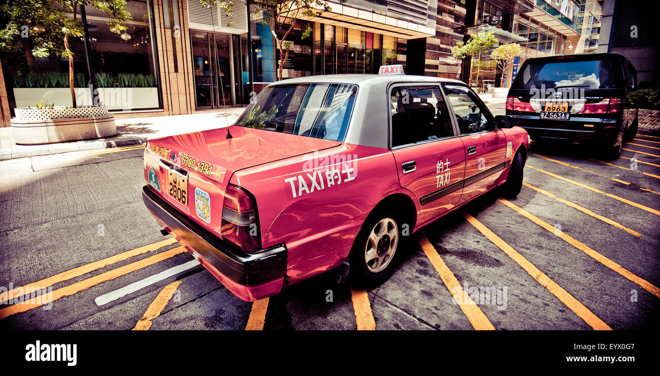 Taxi on the streets of Hong Kong. Stock Photo