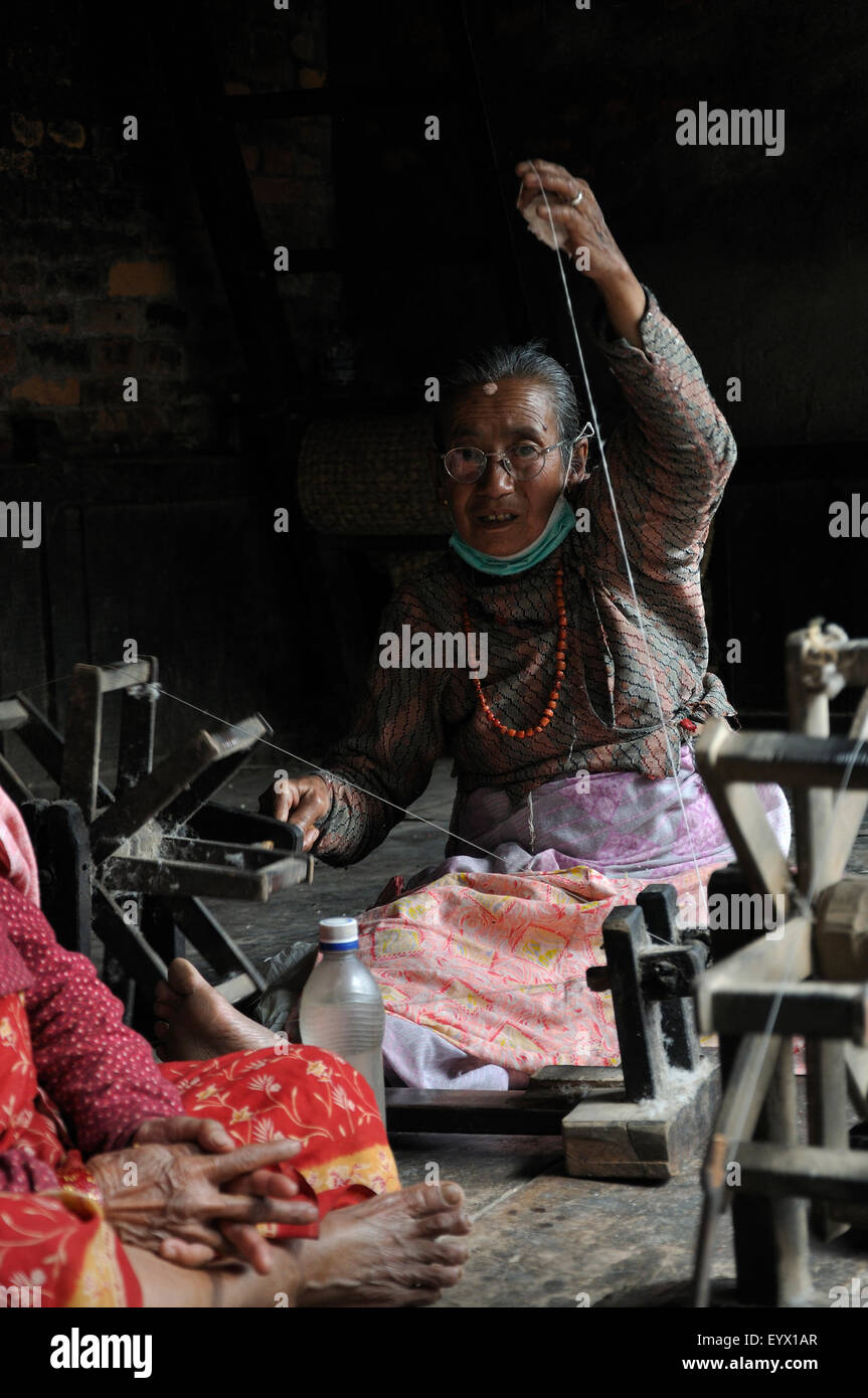 Woman Spinning Wool in Bhaktapur, Nepal Stock Photo