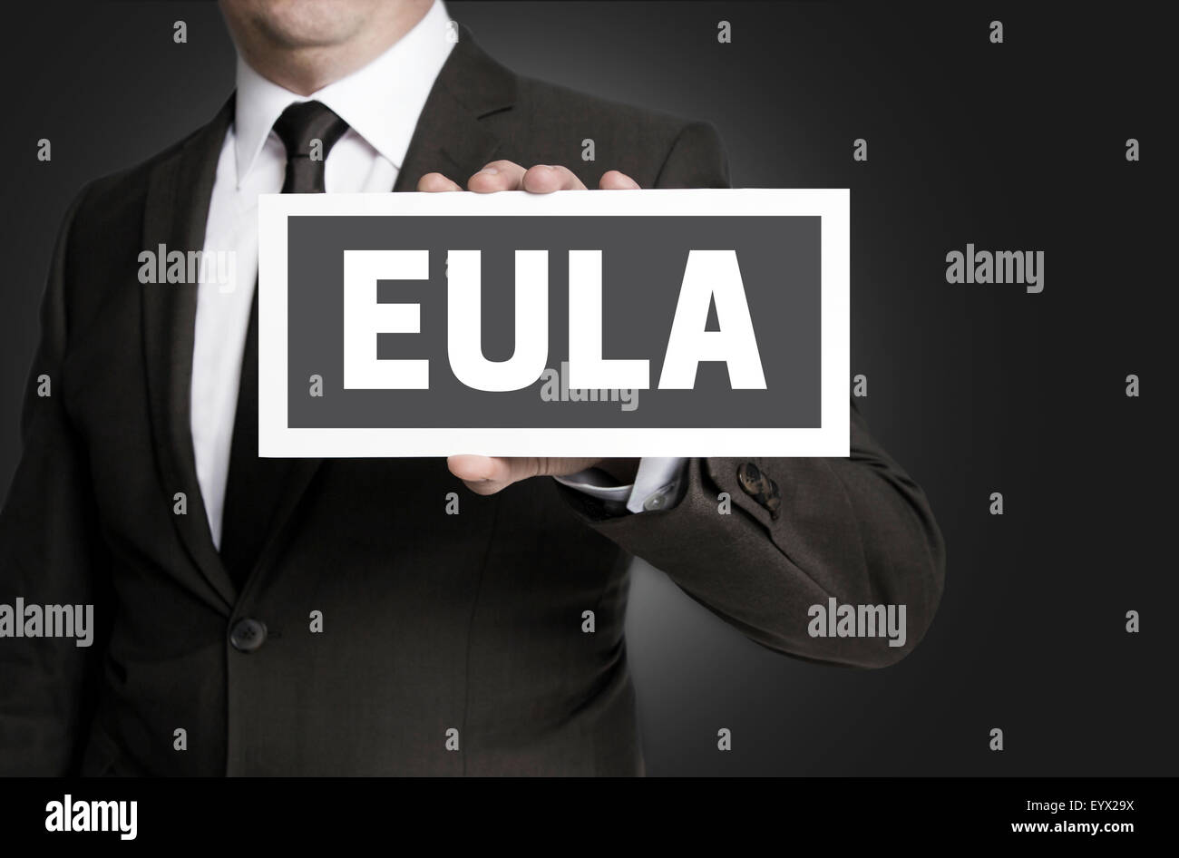 Eula sign is held by businessman. Stock Photo