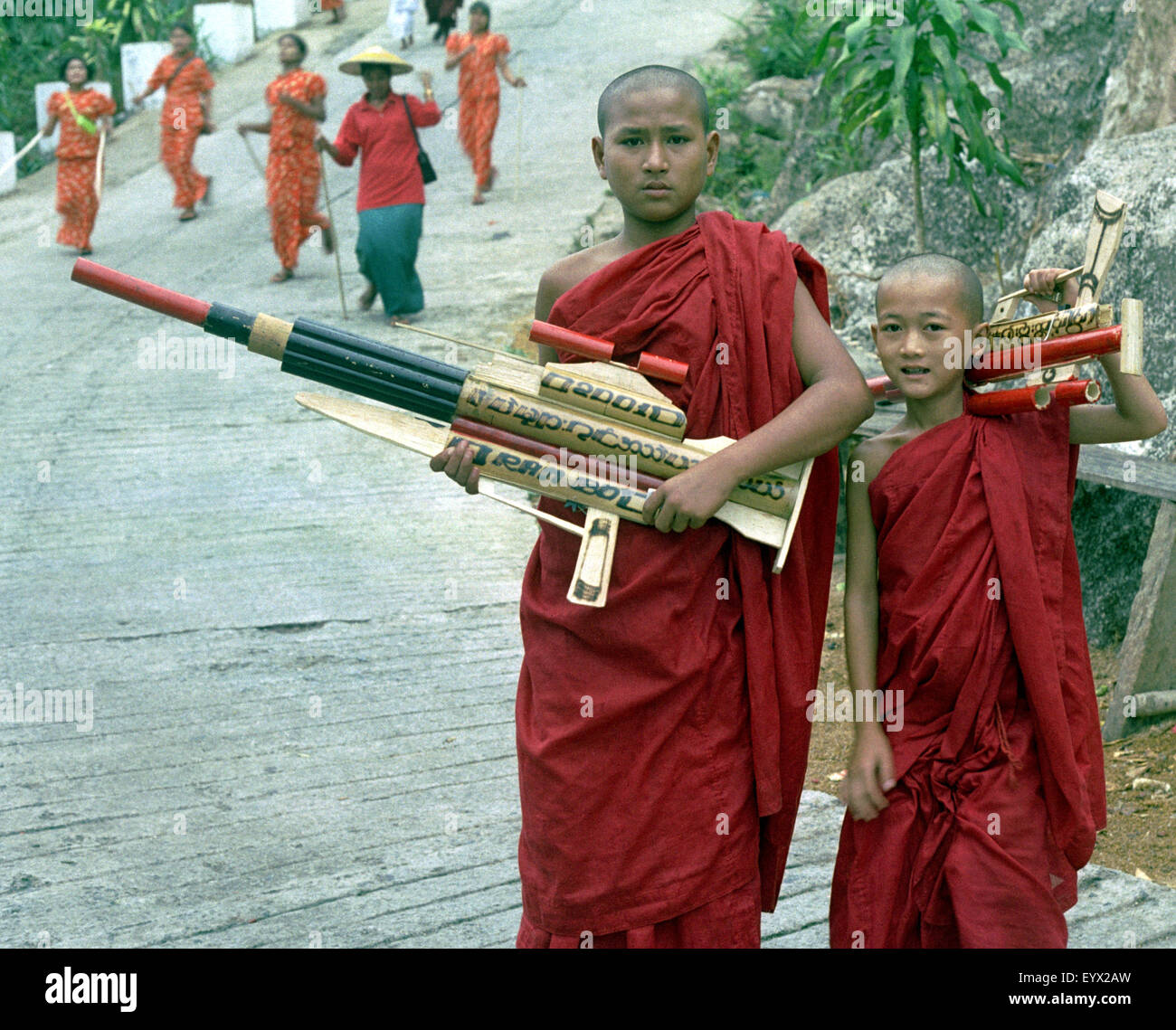 apprentice monks with toy guns myanmar brian mcguire Stock Photo