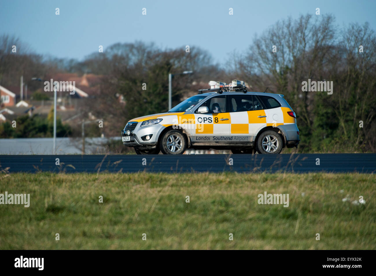 A bird scaring vehicle on the runway at London Southend Airport clearing birds before air traffic lands or takes off. Stock Photo
