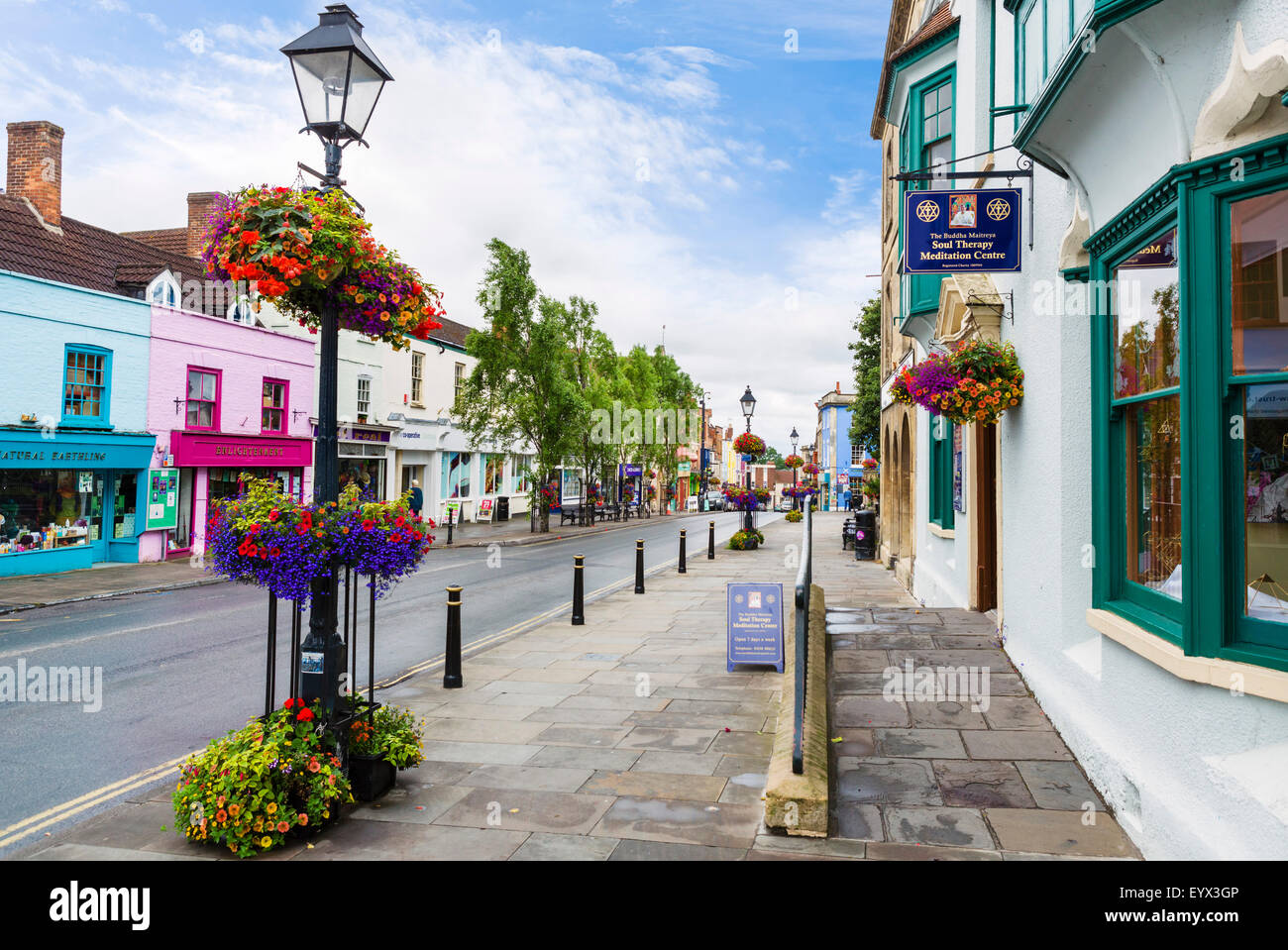 Shops on the High Street in Glastonbury, Somerset, England, UK Stock Photo