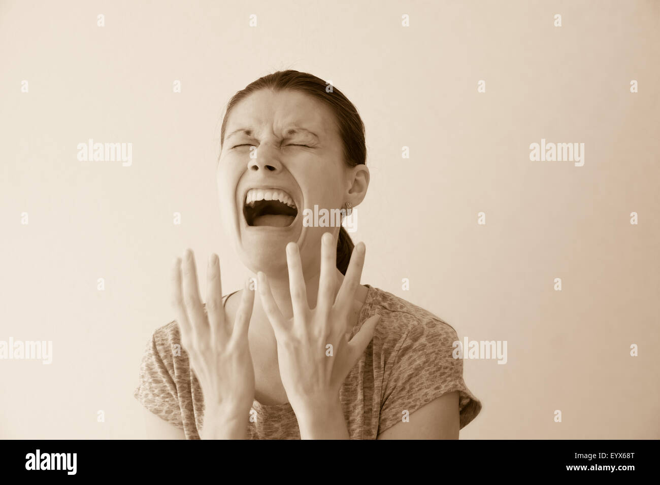 Crying depressed sad abuse young woman, dramatic portrait Stock Photo