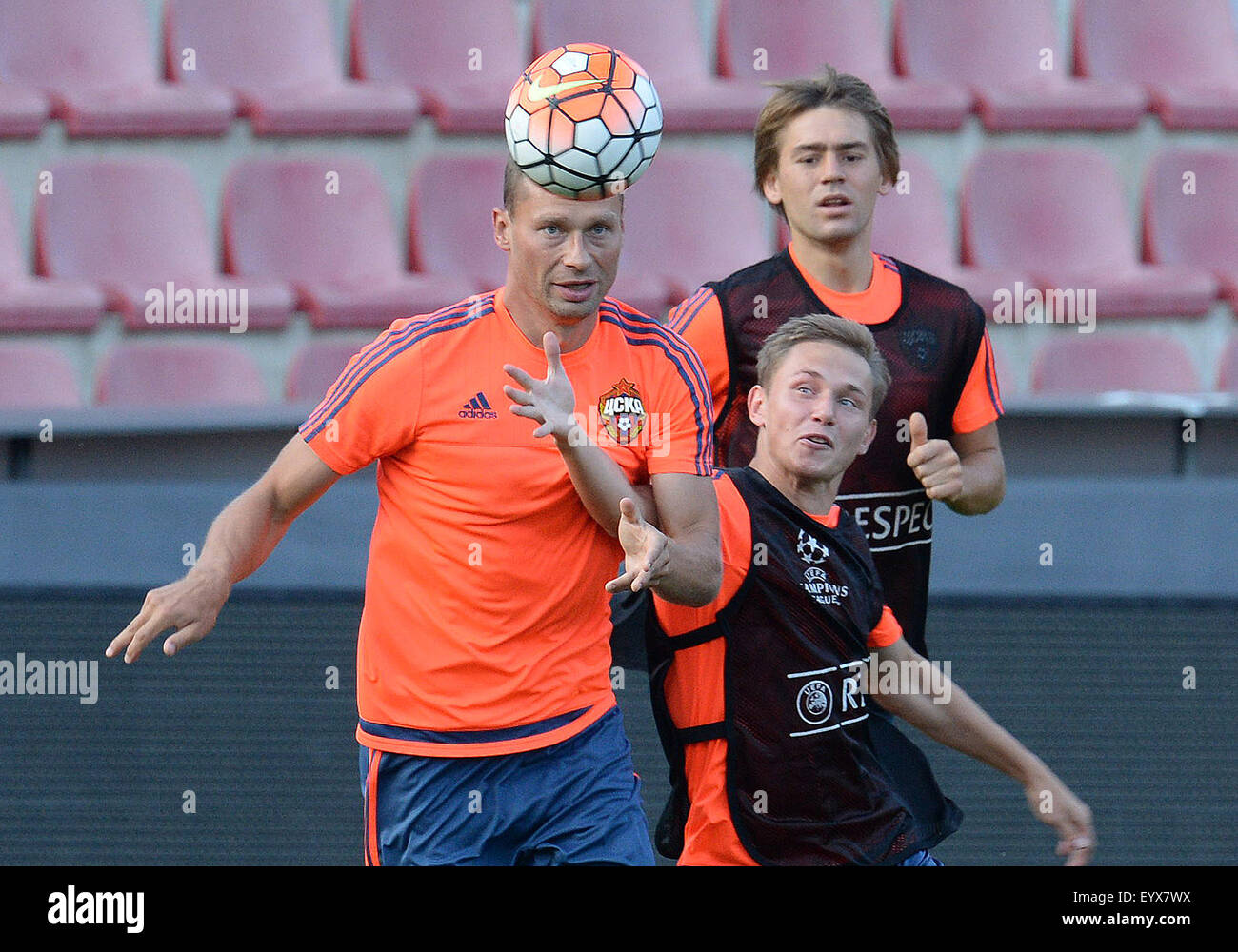 Prague, Czech Republic. 4th Aug, 2015. Soccer players Aleksei Berezutski (left) and Dmitri Yefremov (right) of CSKA Moscow train prior to the third qualifying round of the Champions League return match between Sparta Prague and CSKA Moscow in Prague, Czech Republic, on Tuesday, August 4, 2015. © Michal Dolezal/CTK Photo/Alamy Live News Stock Photo