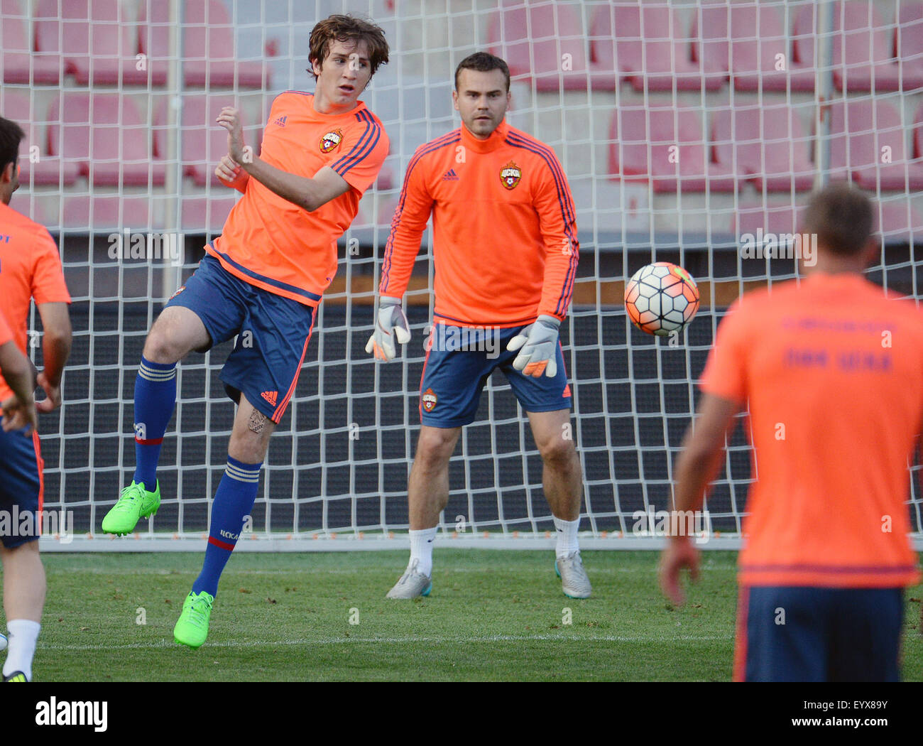 Soccer player Mario Fernandes (left) and goalkeeper Igor Akinfeev of CSKA Moscow train prior to the third qualifying round of the Champions League return match between Sparta Prague and CSKA Moscow in Prague, Czech Republic, on Tuesday, August 4, 2015. (CTK Photo/Michal Dolezal) Stock Photo