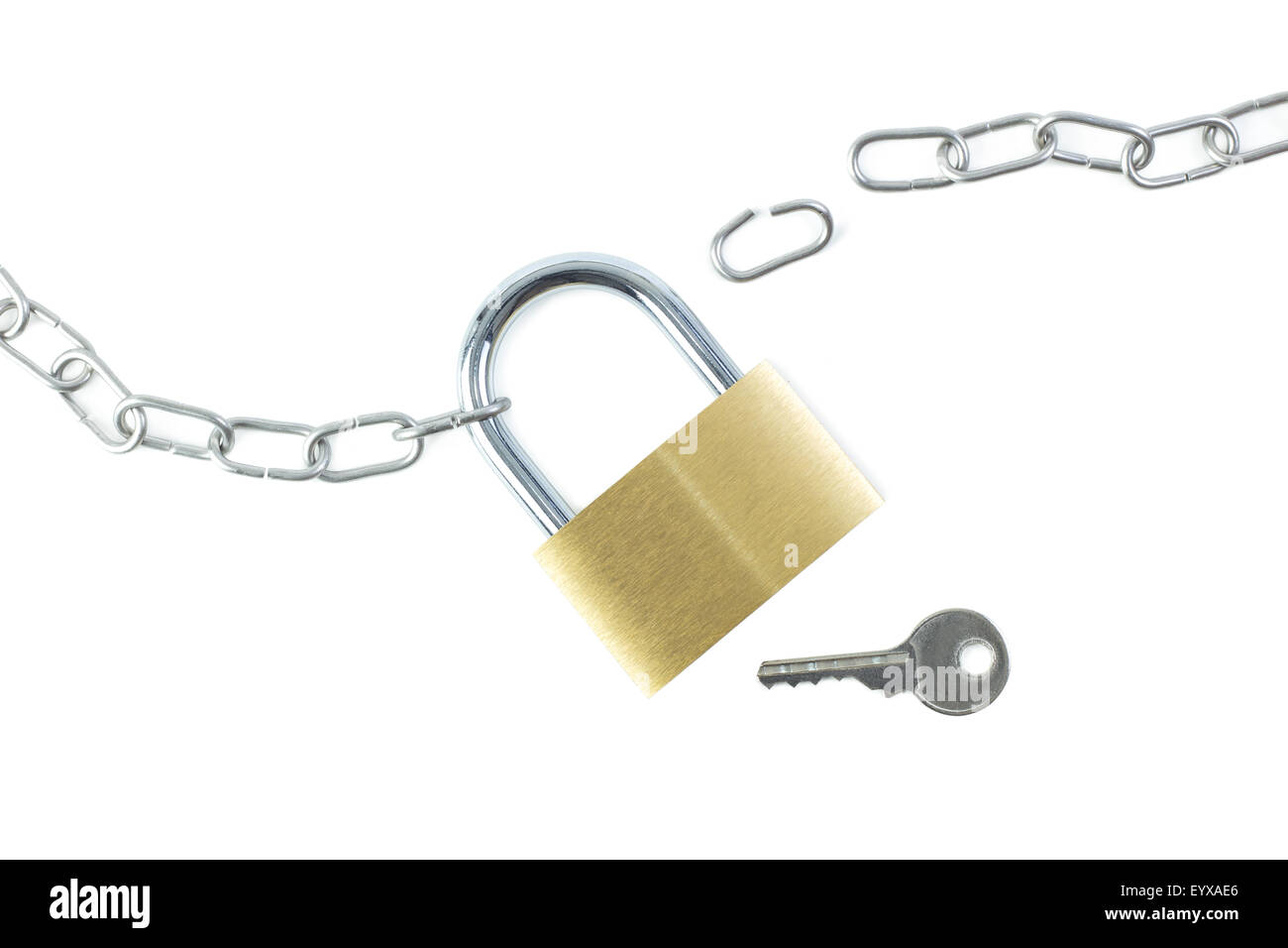 Broken metal chain, locked padlock and a key viewed from above
