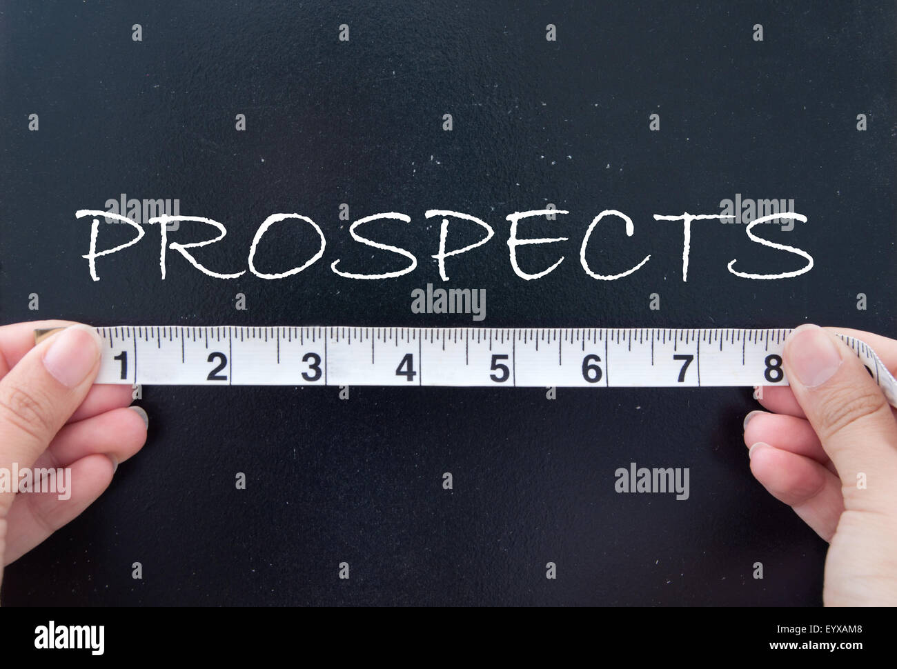 Tape measuring the word prospects written on a chalkboard Stock Photo