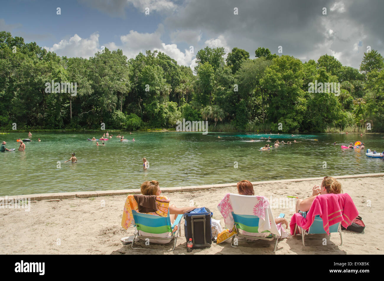 3 women in beach chairs at Alexander Springs State Recreation Area, Ocala National forest Florida. Stock Photo