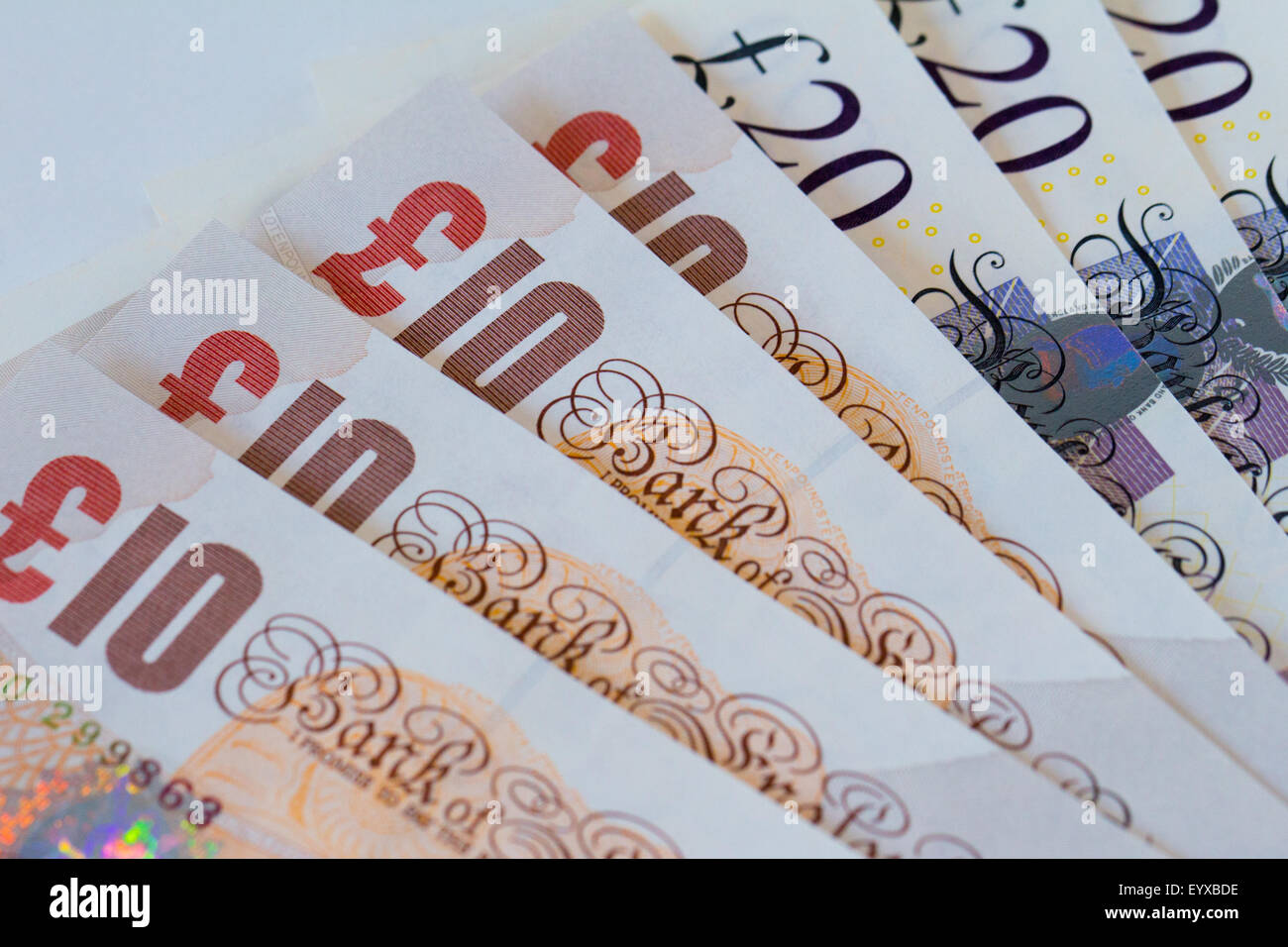 Background of ten and twenty UK pound bank notes (sterling) Stock Photo