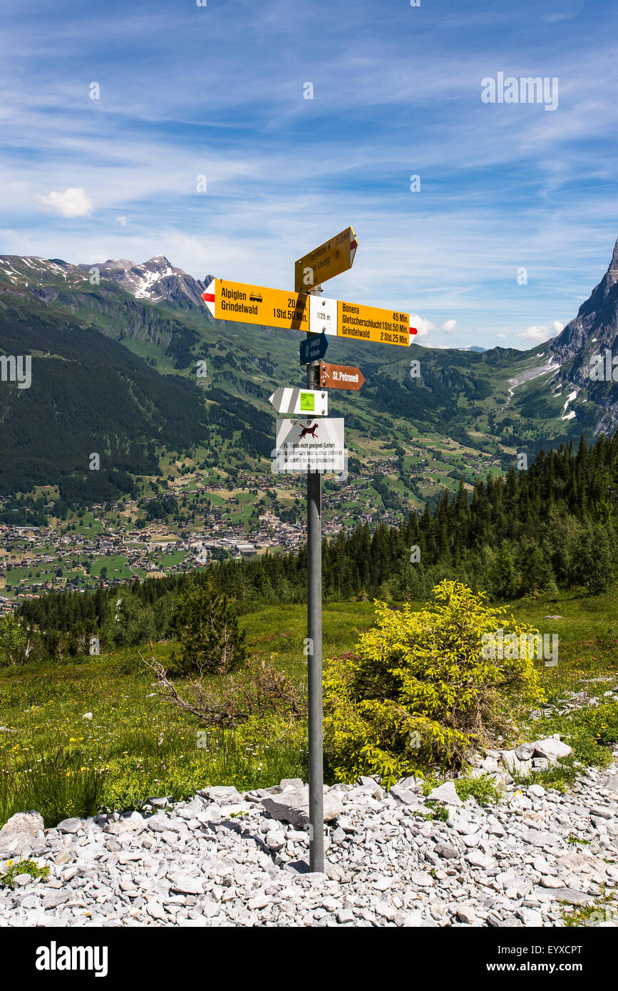 Walking trail signpost in the Swiss alps Stock Photo