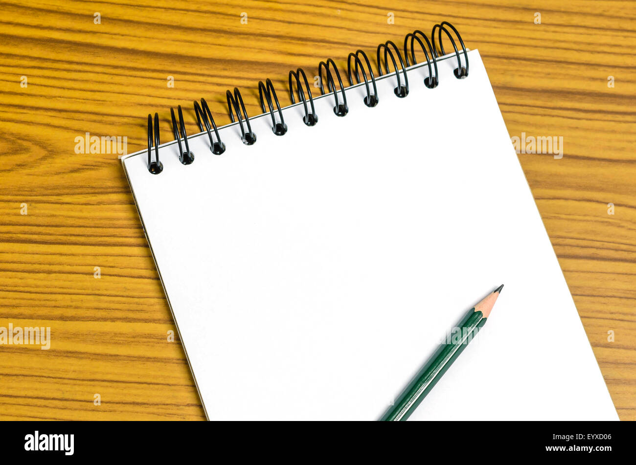Blank paper and pencil on the wooden table Stock Photo - Alamy