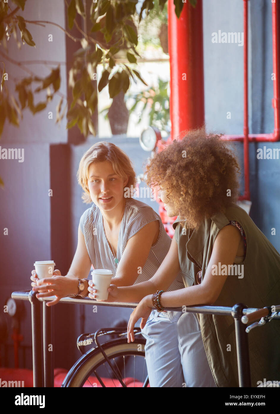 Person leaning on railing hi-res stock photography and images - Alamy