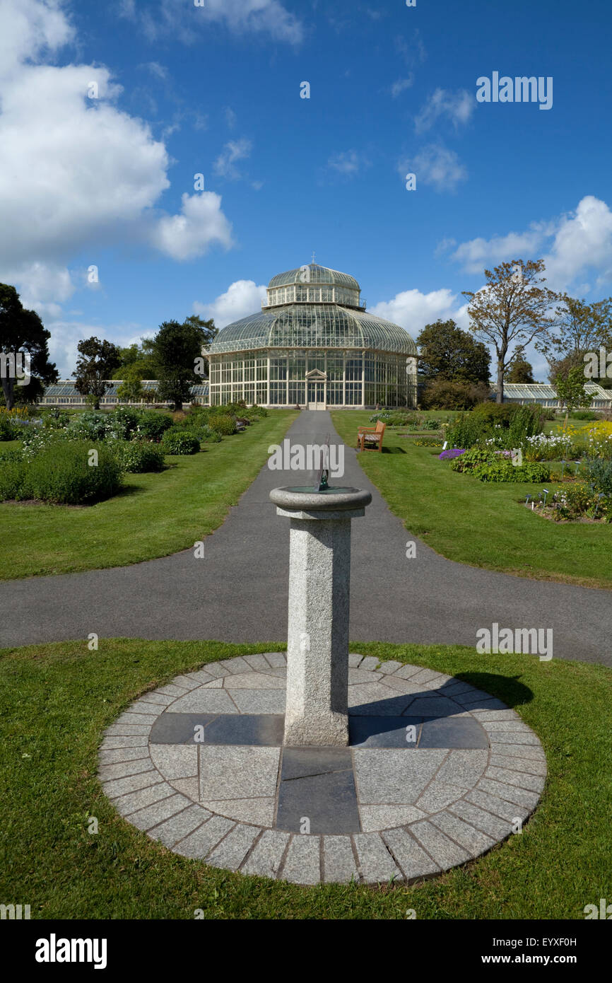 Sun dial and path to the The Palm House, National Botanic Gardens, Glasnevin, Dublin City, Ireland Stock Photo