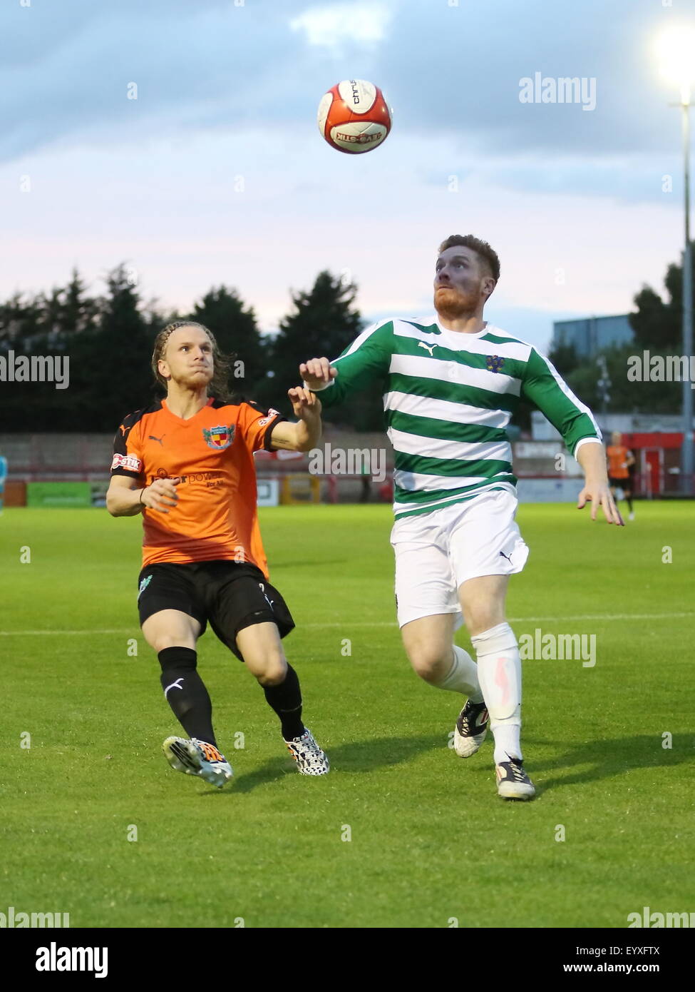 Northwich, Cheshire, UK. 4th August, 2015. Northwich Victoria beat Nantwich Town 2-0 in a pre season friendly held at Witton Albion's Wincham Park in Northwich. Nantwich Town's Matty Kosylo challenges Northwich's Anthony Smart. Credit:  Simon Newbury/Alamy Live News Stock Photo