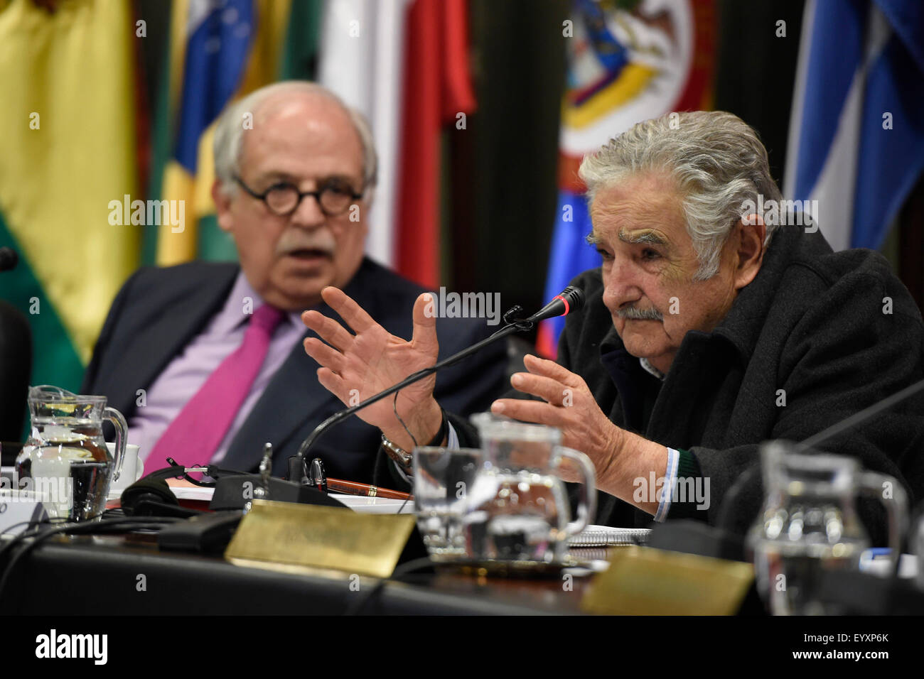 Montevideo, Uruguay. 4th Aug, 2015. Senator and former President of Uruguay Jose Mujica (R) and Special Advisor for International Affairs of Brazil Marco Aurelio Garcia (L) take part in the conference 'The integration prospects viewed from Brazil and Uruguay', in the seat of the Latin American Integration Association (ALADI), in Montevideo, capital of Uruguay, on Aug. 4, 2015. Credit:  Nicolas Celaya/Xinhua/Alamy Live News Stock Photo