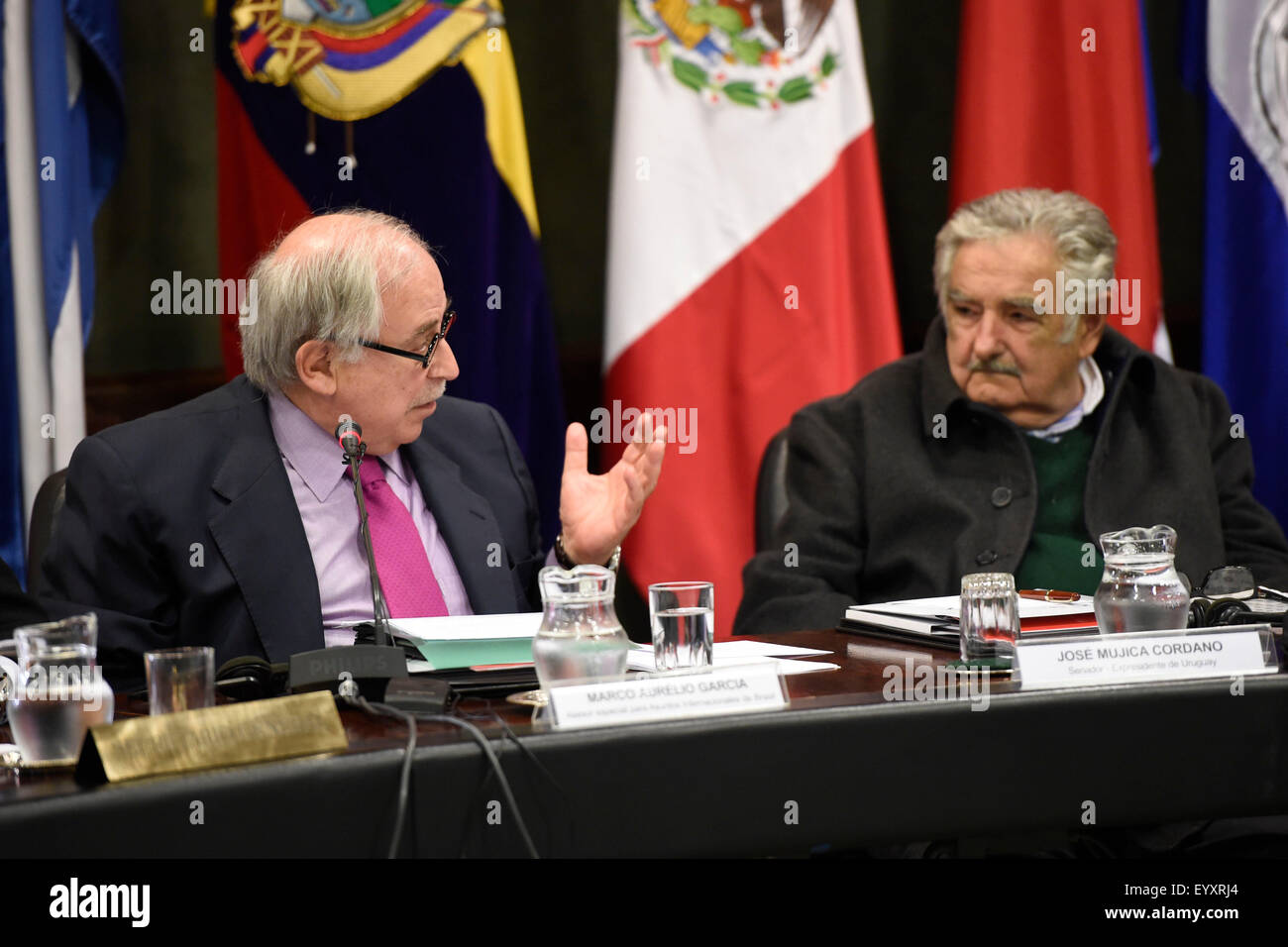 Montevideo, Uruguay. 4th Aug, 2015. Senator and former President of Uruguay Jose Mujica (R) and Special Advisor for International Affairs of Brazil Marco Aurelio Garcia (L) take part in the conference 'The integration prospects viewed from Brazil and Uruguay', in the seat of the Latin American Integration Association (ALADI), in Montevideo, capital of Uruguay, on August 4, 2015. Credit:  Nicolas Celaya/Xinhua/Alamy Live News Stock Photo