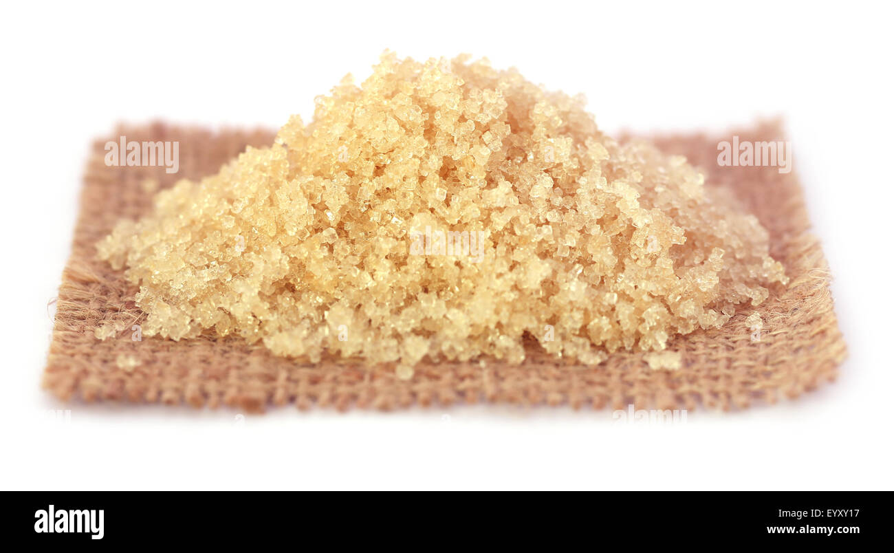 Coarse crystals of brown sugar on a sack Stock Photo - Alamy