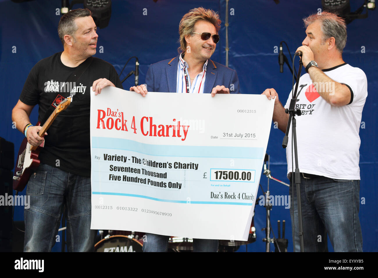 Musicians on stage at an open air county festival, the South Glos Show