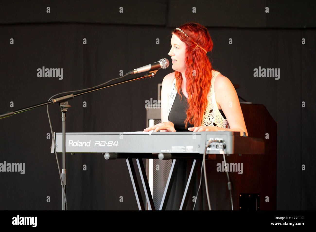 Musicians on stage at an open air county festival, the South Glos Show