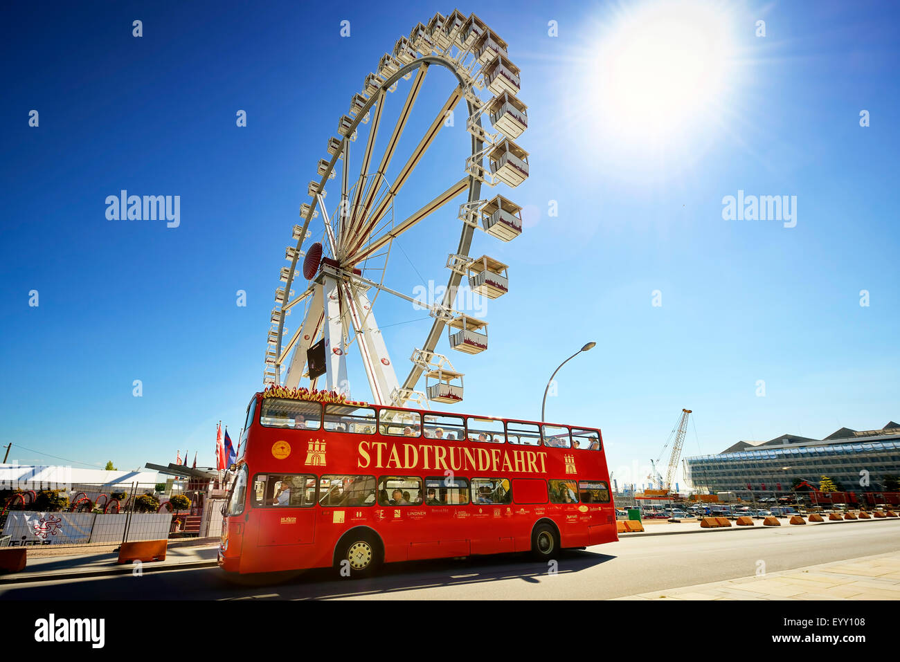 Bus for city tours and ferris wheel at the cruise terminal, Hamburg, Germany Stock Photo