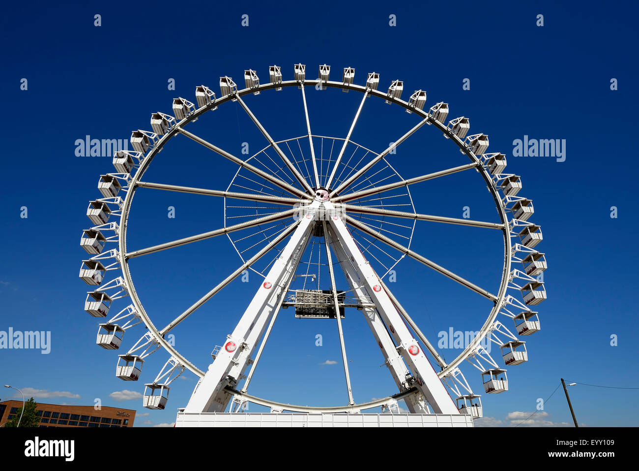 Ferris wheel at Strandkai in the harbor city, Hamburg, Germany Stock Photo