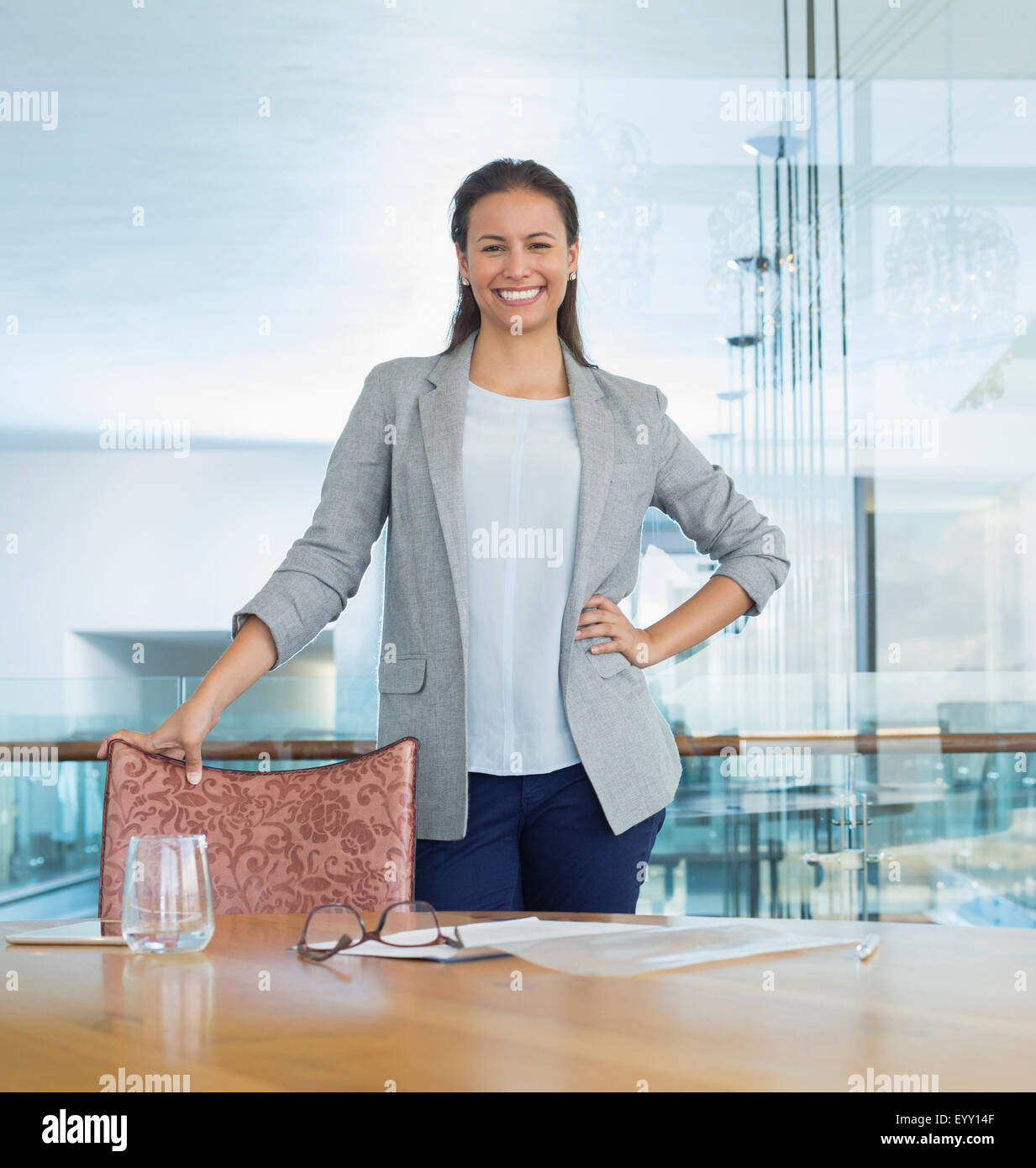 Portrait confident businesswoman in conference room Stock Photo