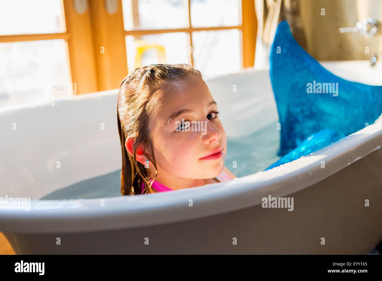 one girl is bathing