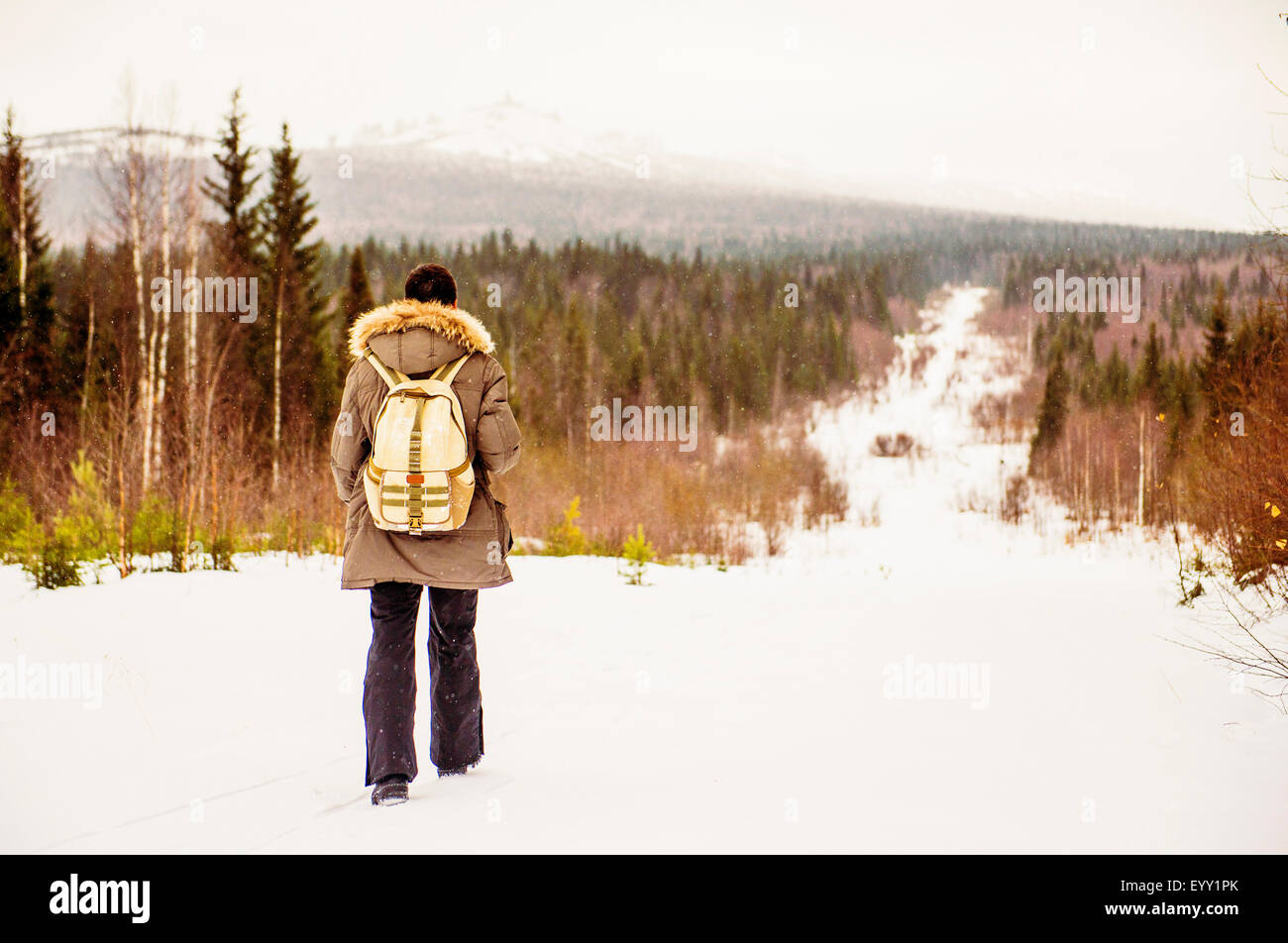 Man parka snow rear view hi-res stock photography and images - Alamy