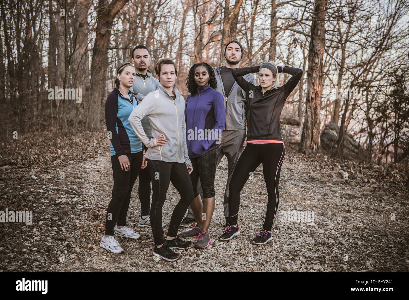 Runners standing on forest path Stock Photo - Alamy