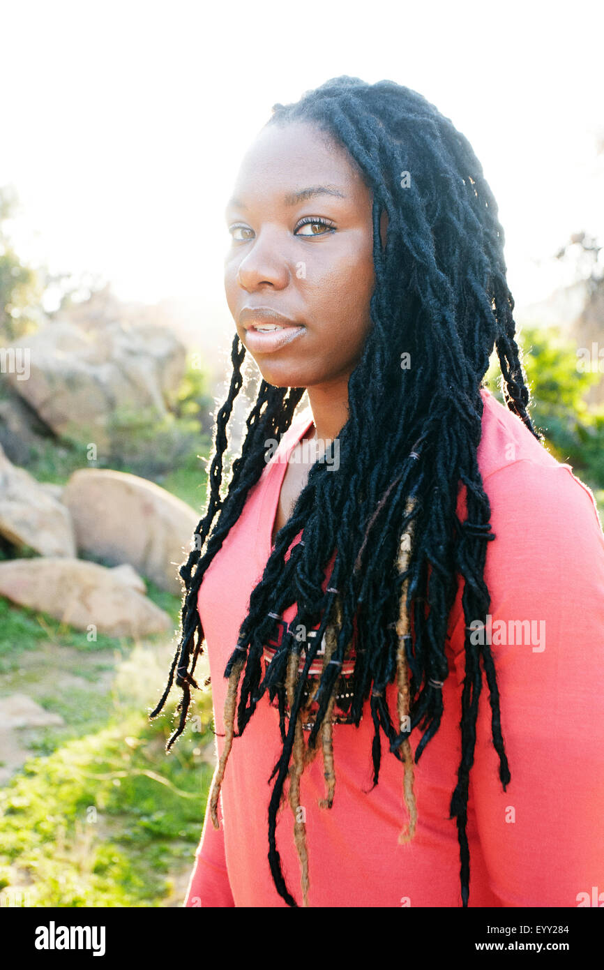 Woman standing outdoors hi-res stock photography and images - Alamy