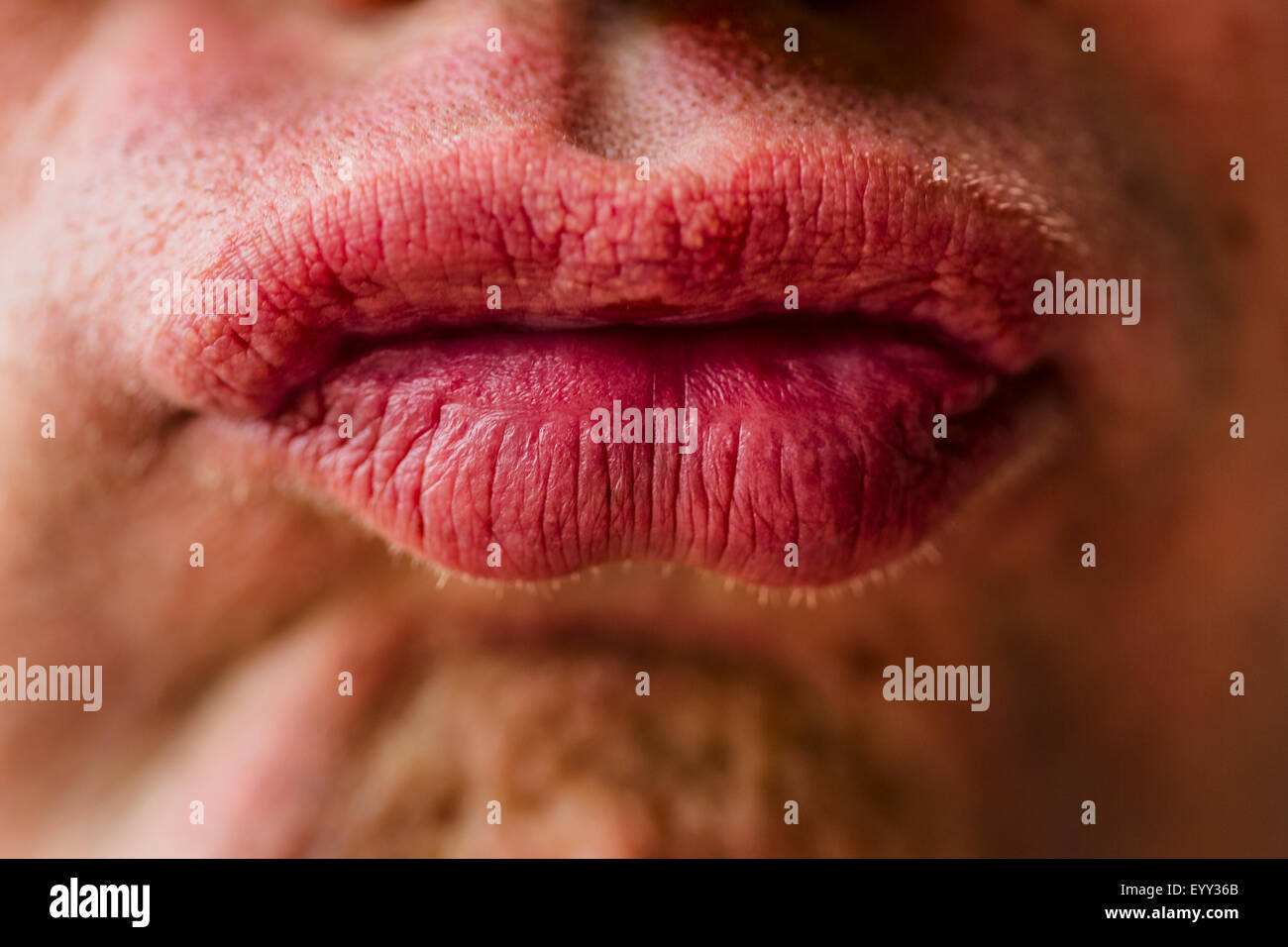 Close up of lips of pouting Caucasian man Stock Photo - Alamy