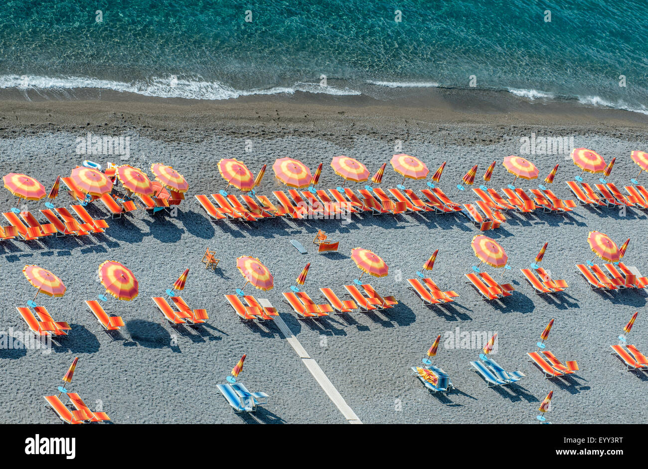 Aerial view of lawn chairs and umbrellas on beach Stock Photo