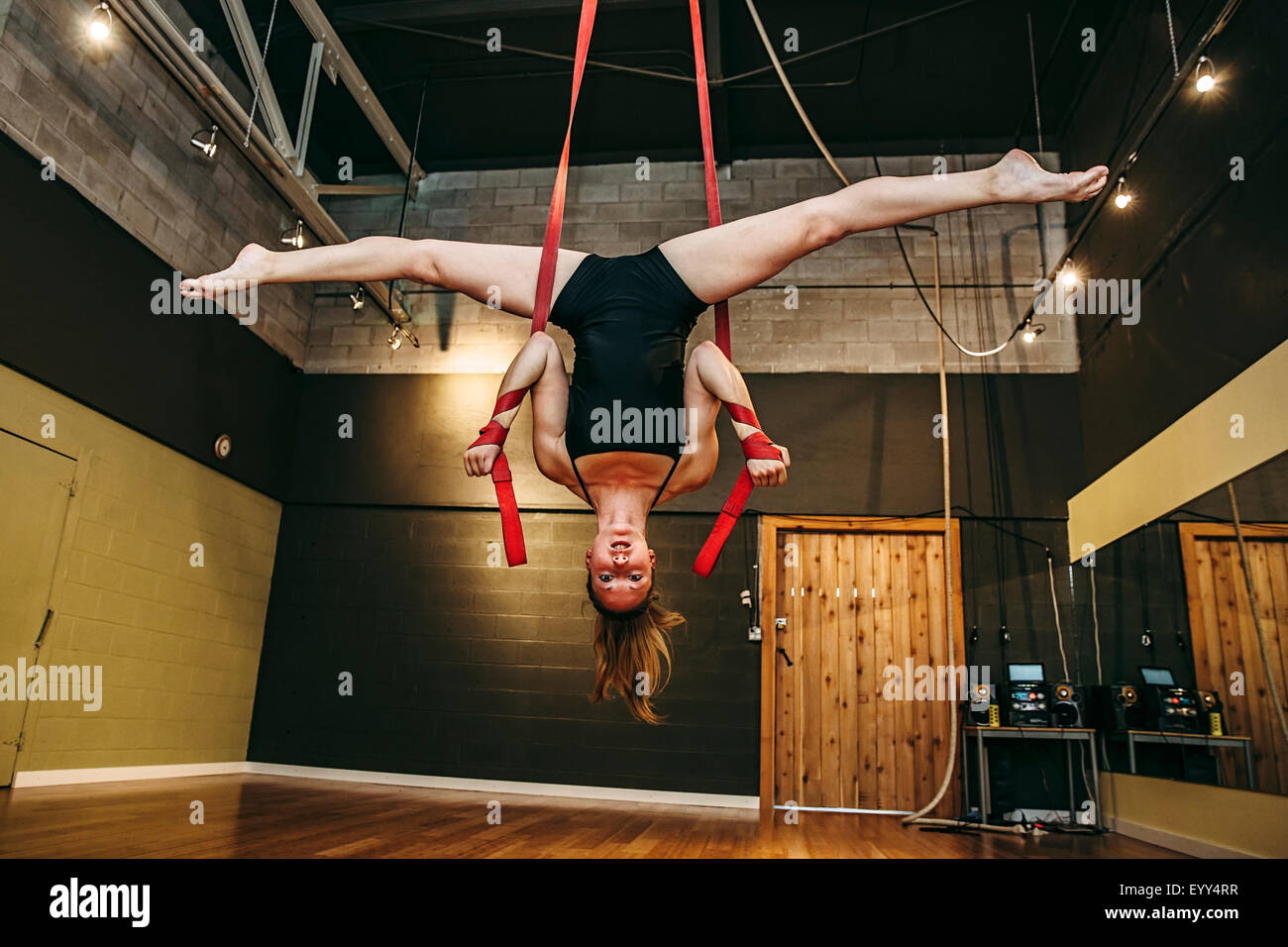 Woman hanging upside down from hi-res stock photography and images - Alamy