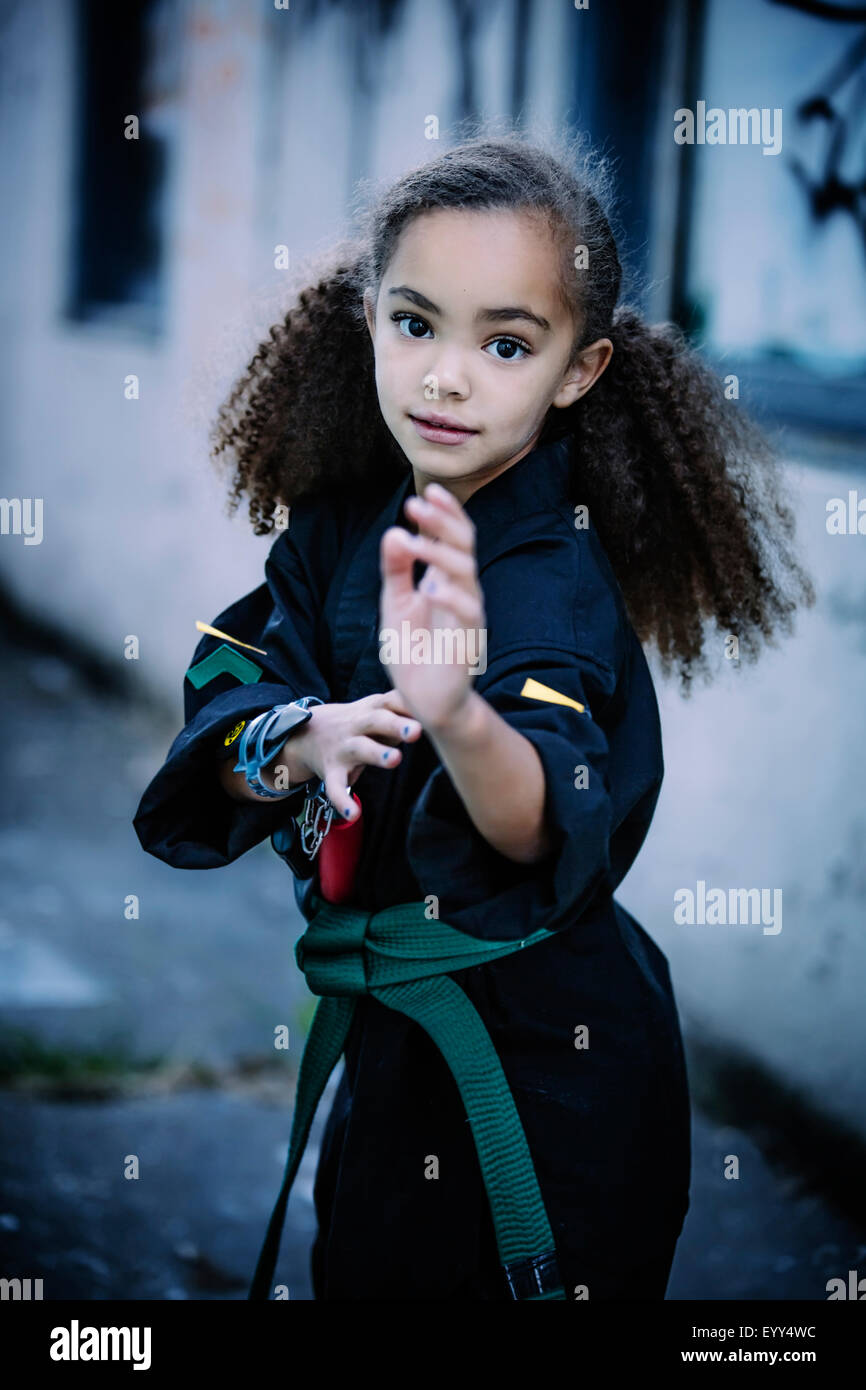 Mixed race girl practicing martial arts Stock Photo Alamy
