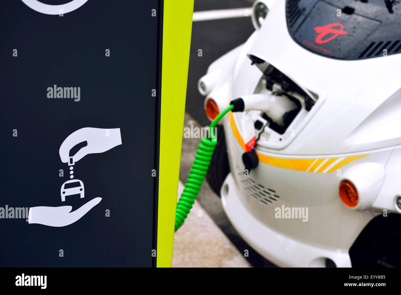 Electric car at charging station, France Stock Photo Alamy