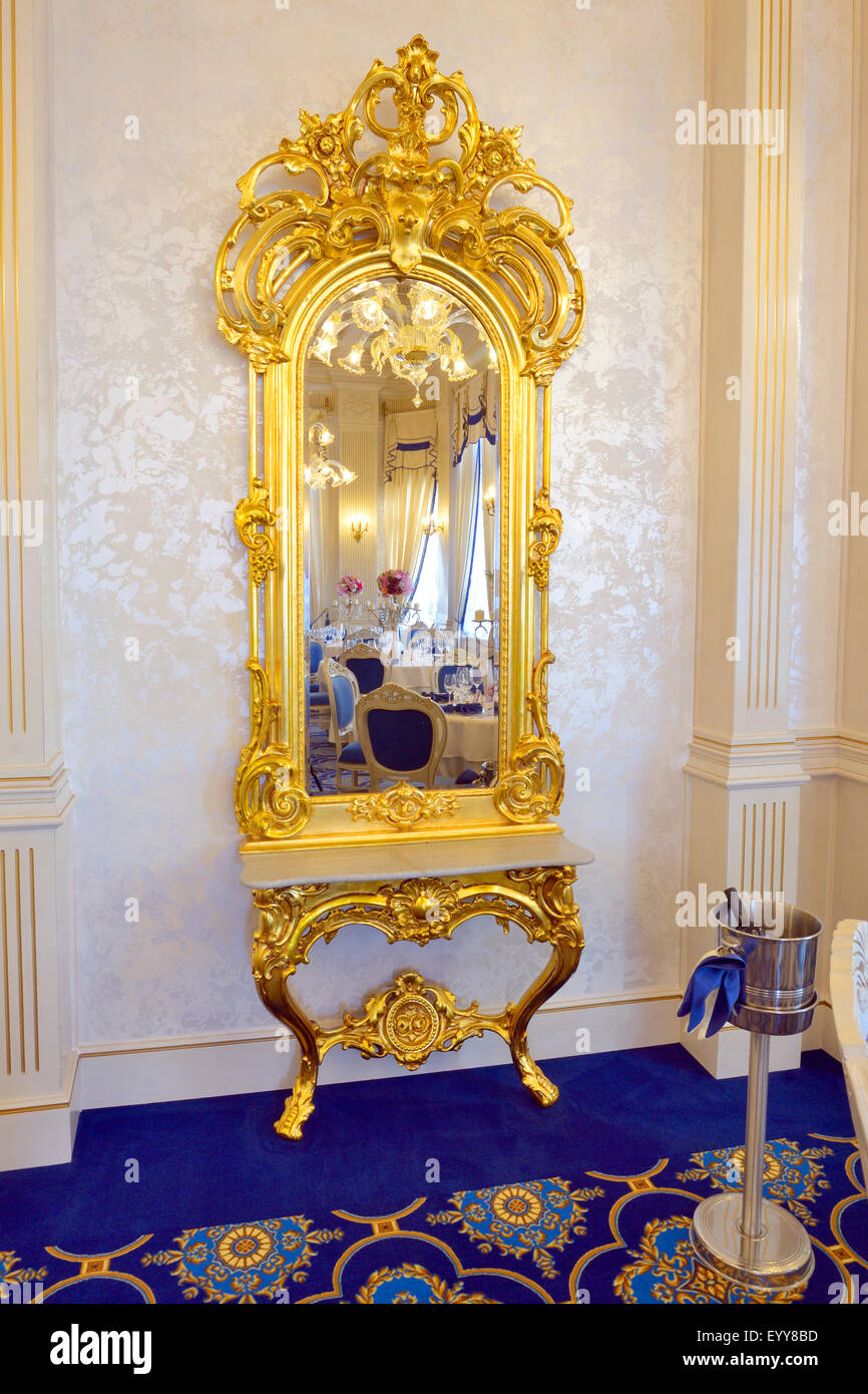 Ancient mirror in luxury restaurant Stock Photo