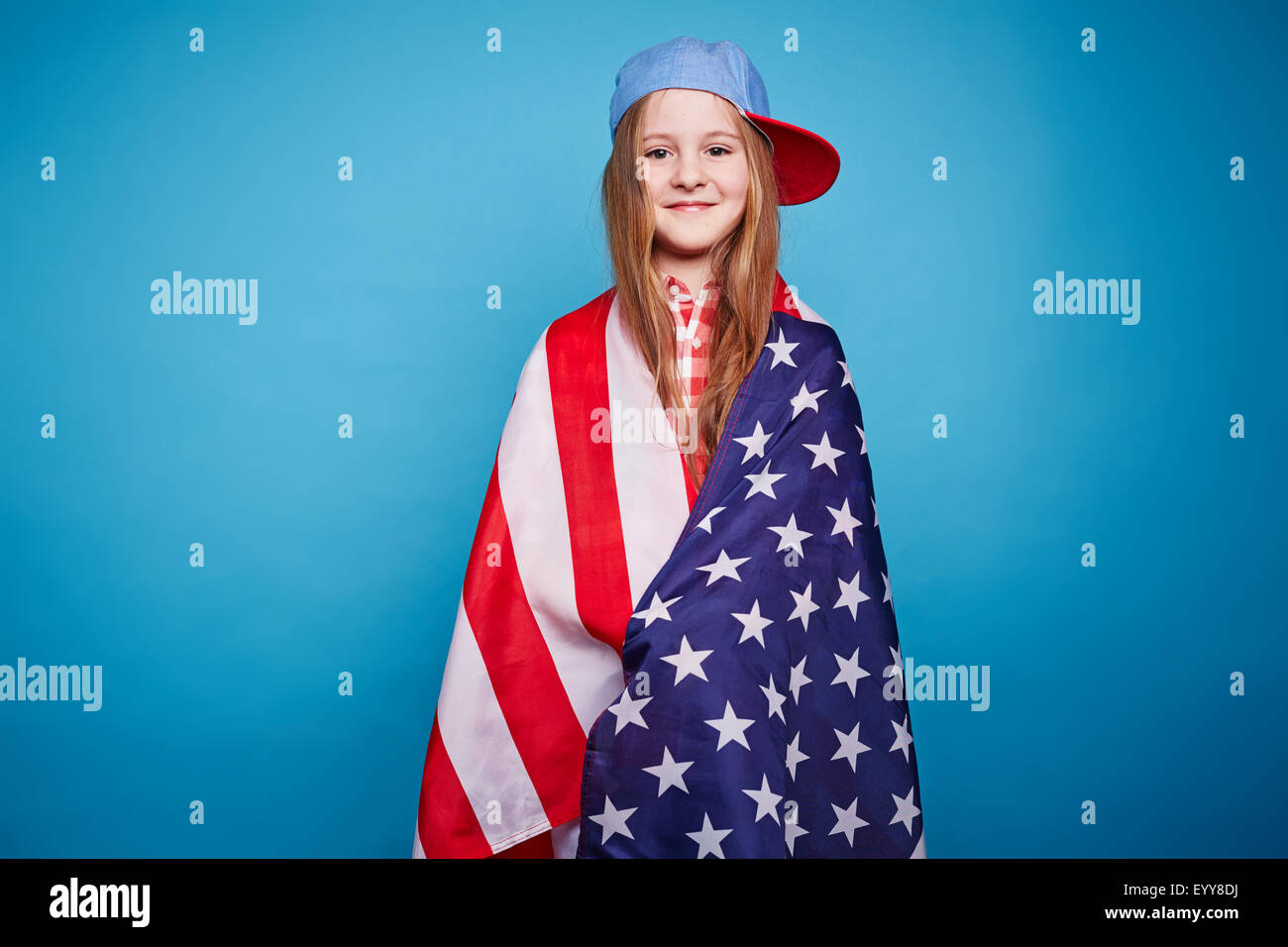 Girl wrapped in american flag hi-res stock photography and images - Alamy